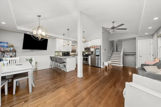 a very nice looking living room with furniture and a wooden floor