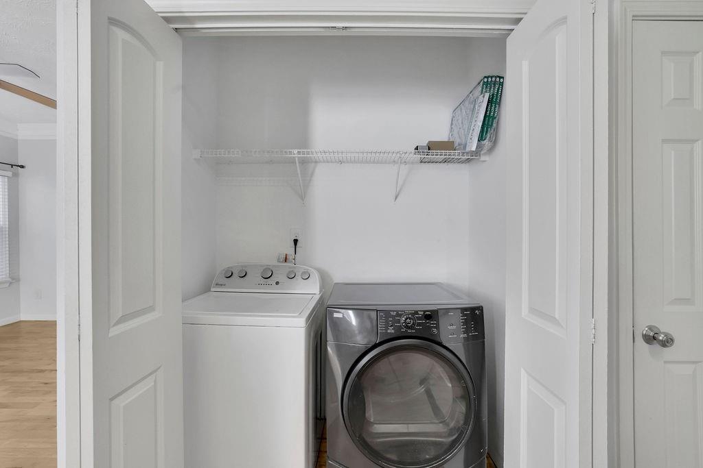 4085 Spring Cove Drive Duluth, GA 30097 - Photo 18 of 45 a utility room with dryer and washer
