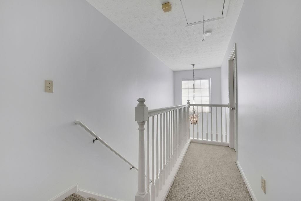 4085 Spring Cove Drive Duluth, GA 30097 - Photo 20 of 45 a view of a hallway with a window