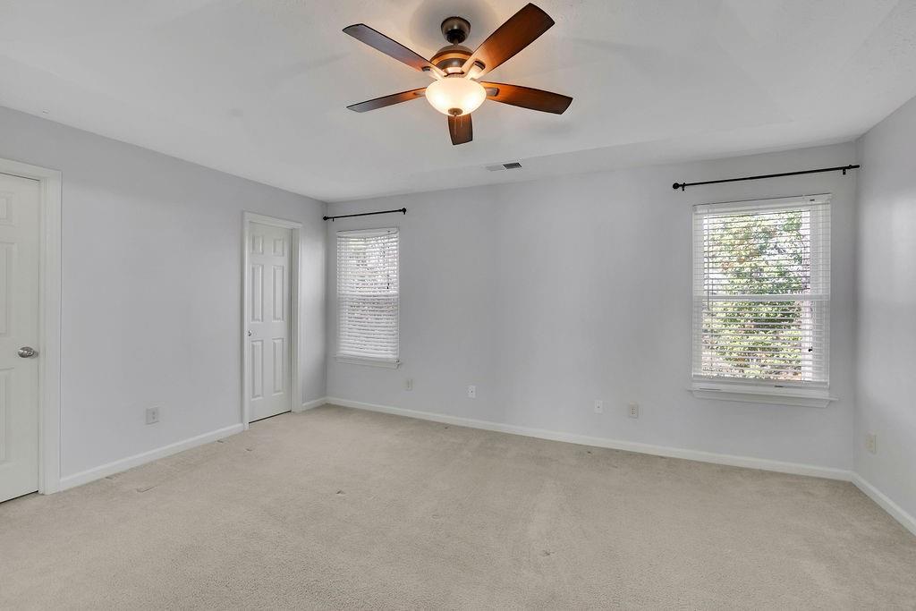 4085 Spring Cove Drive Duluth, GA 30097 - Photo 23 of 45 a view of an empty room with a window