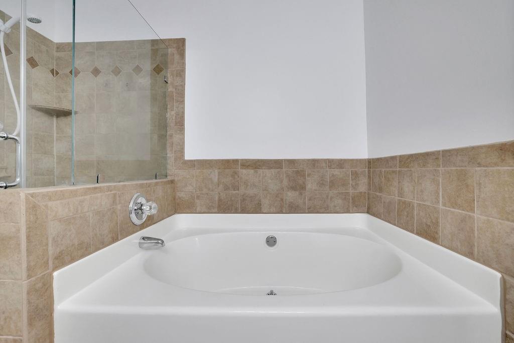 4085 Spring Cove Drive Duluth, GA 30097 - Photo 26 of 45 a bathroom with a bathtub