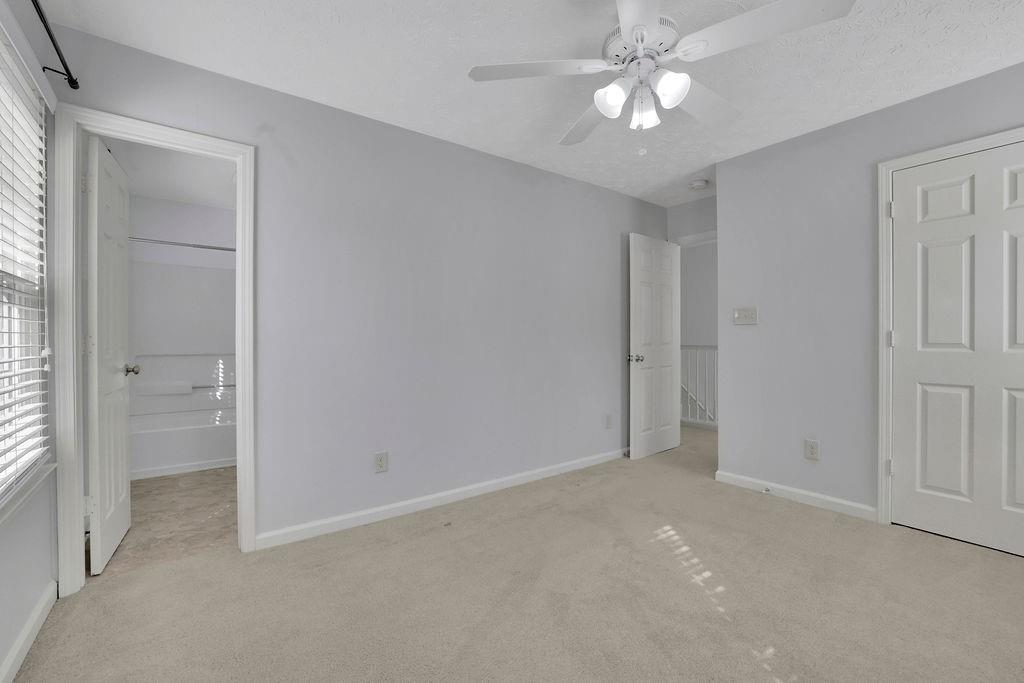 4085 Spring Cove Drive Duluth, GA 30097 - Photo 31 of 45 a view of an empty room and a bathroom