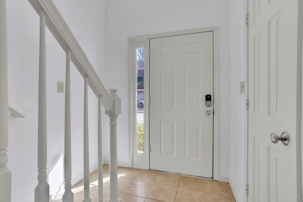 4085 Spring Cove Drive Duluth, GA 30097 - Photo 4 of 45 a view of a livingroom and a hallway