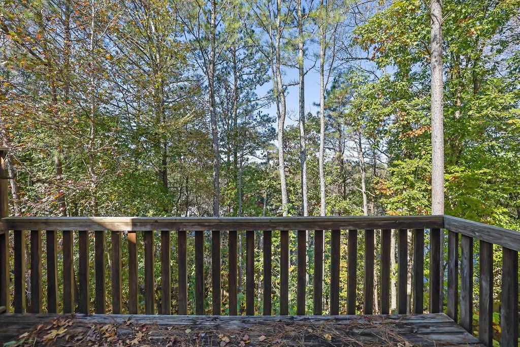 4085 Spring Cove Drive Duluth, GA 30097 - Photo 41 of 45 a wooden fence with trees in the background