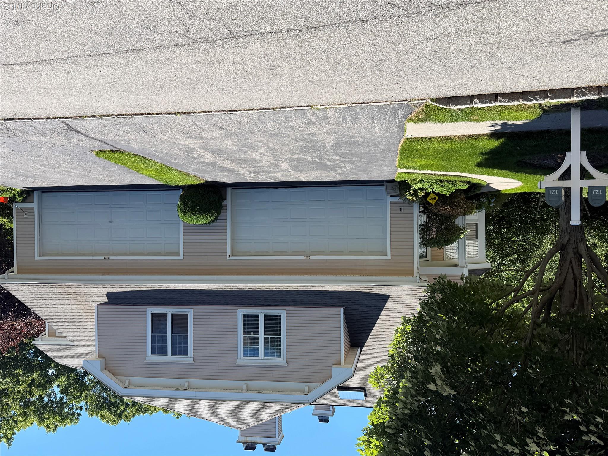 121 Winding Ridge Road White Plains, NY 10603 - Photo 1 of 43 Left side is 121 exterior featuring two car garage
