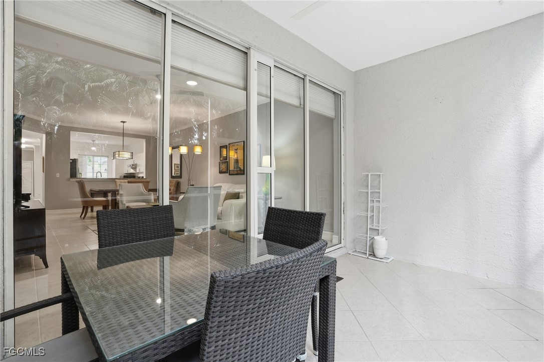 770 Luisa Lane, Unit 3 Naples, FL 34104 - Photo 17 of 38 a living room with furniture