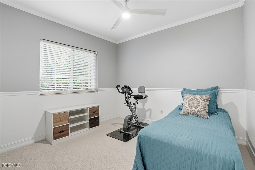 770 Luisa Lane, Unit 3 Naples, FL 34104 - Photo 22 of 38 a bedroom with furniture and a window