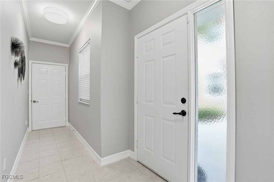 770 Luisa Lane, Unit 3 Naples, FL 34104 - Photo 33 of 38 a bathroom with a shower