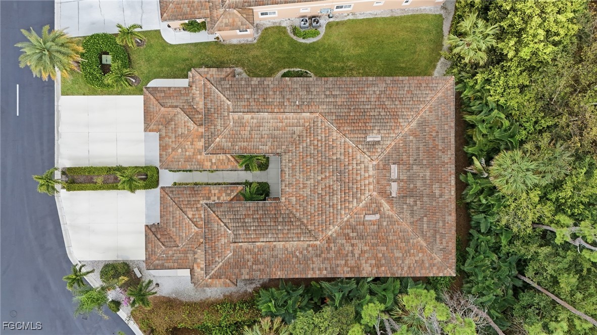 770 Luisa Lane, Unit 3 Naples, FL 34104 - Photo 36 of 38 an aerial view of a house with a yard