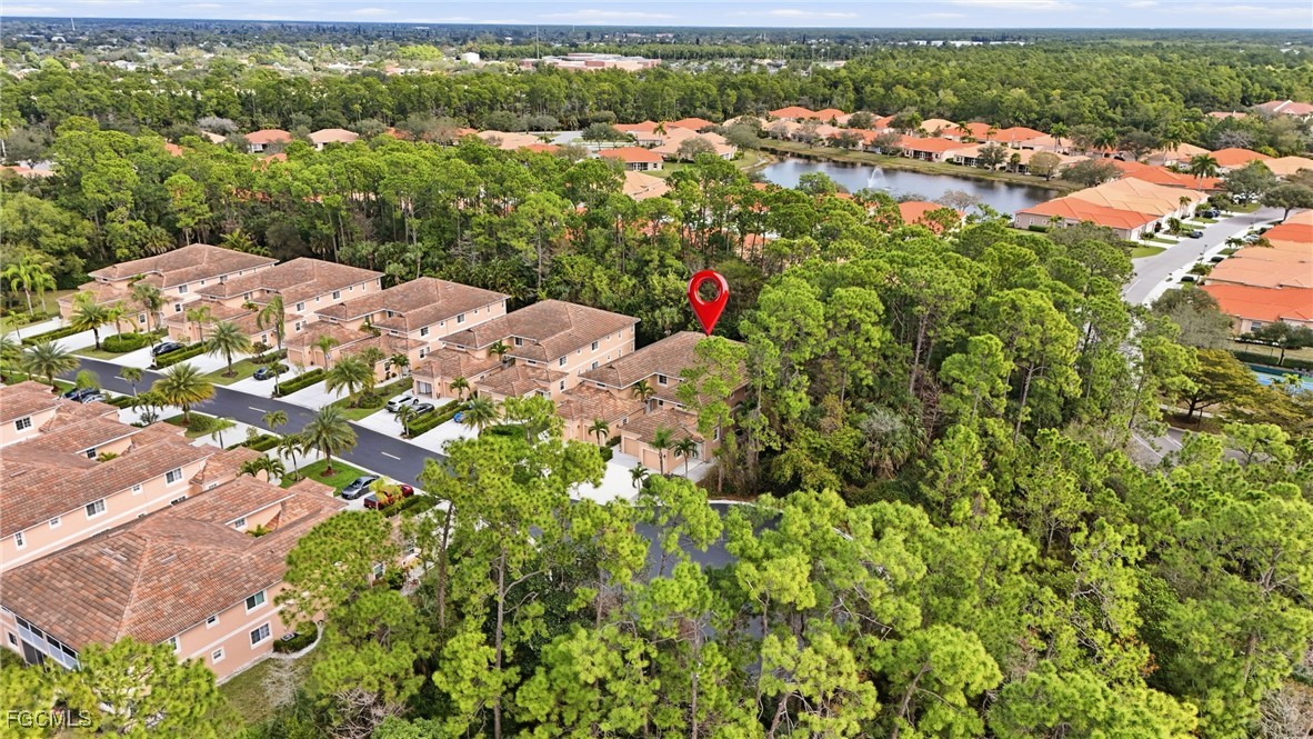 770 Luisa Lane, Unit 3 Naples, FL 34104 - Photo 37 of 38 an aerial view of a houses with yard