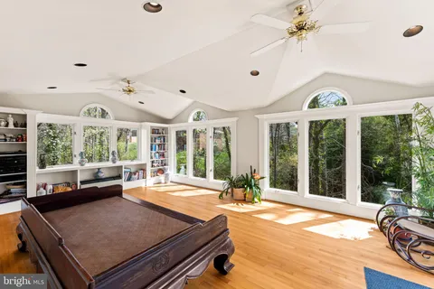 a view of a room with furniture and garden