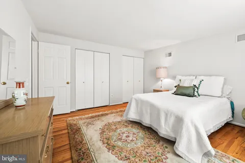 a view of a livingroom with furniture and staircase