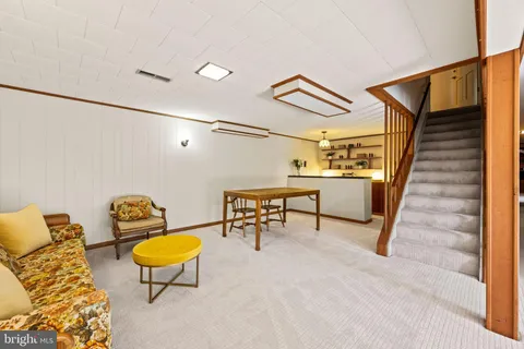a view of a room with a large window