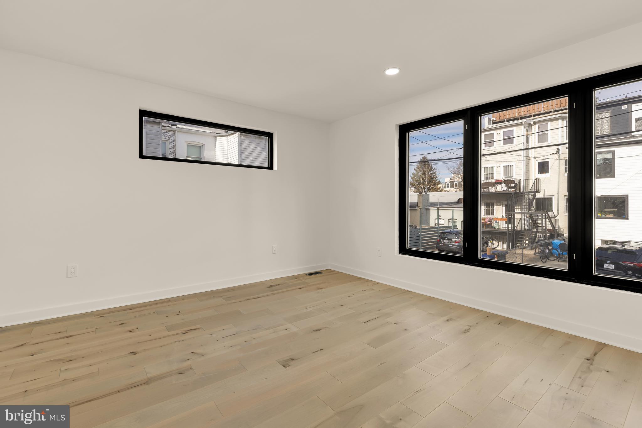 641 Quebec Place Northwest, Unit 1 Washington, DC 20010 - Photo 15 of 30 a view of an empty room with a window
