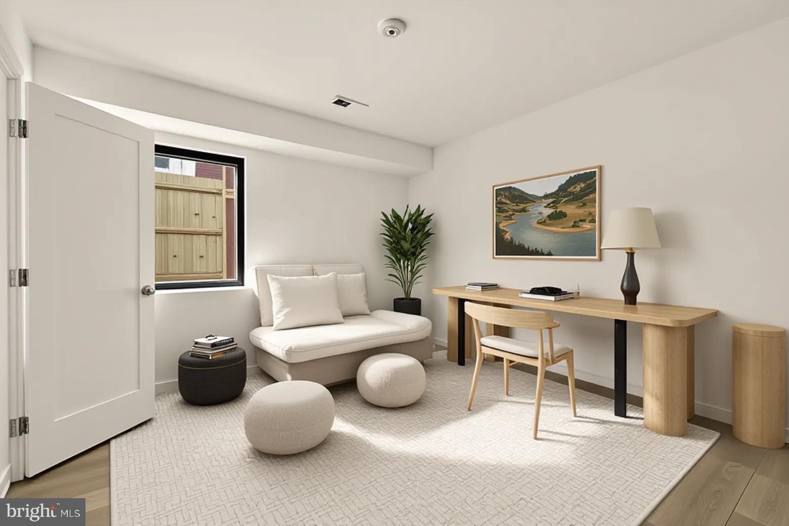 641 Quebec Place Northwest, Unit 1 Washington, DC 20010 - Photo 28 of 30 a living room with furniture and a wooden floor