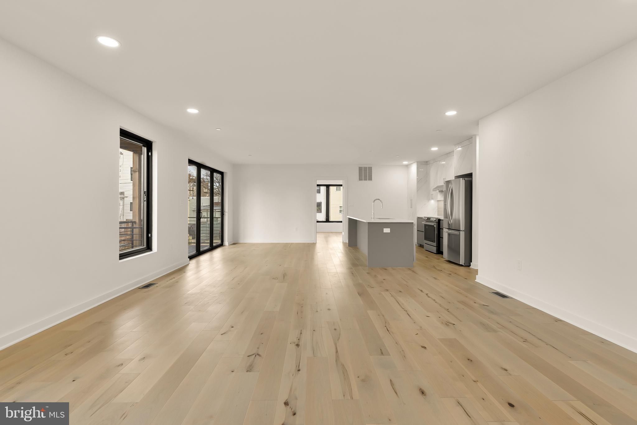 641 Quebec Place Northwest, Unit 1 Washington, DC 20010 - Photo 3 of 30 a view of empty room with wooden floor