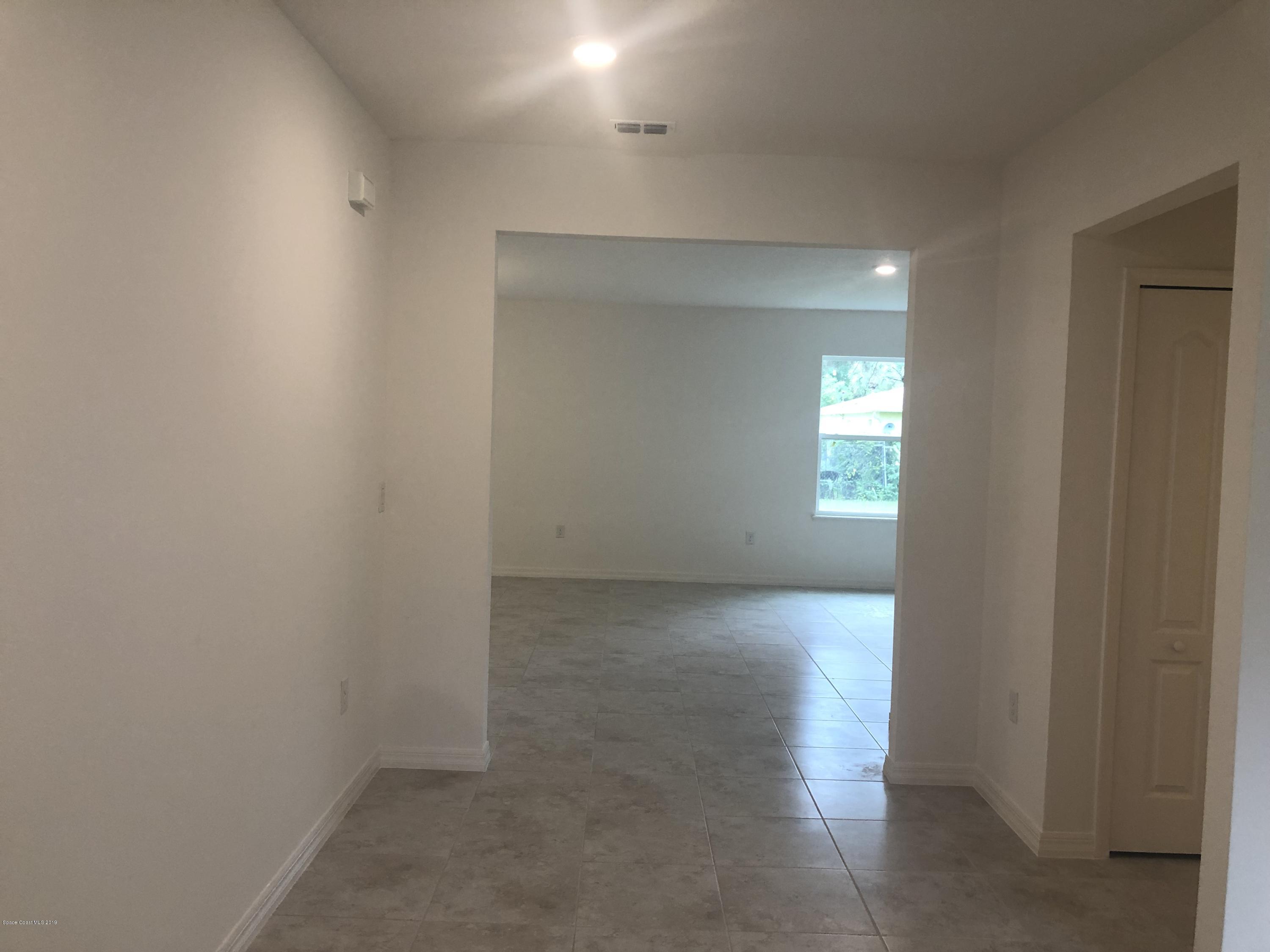 967 Castile Road Southeast Palm Bay, FL 32909 - Photo 3 of 17 IMG_3380