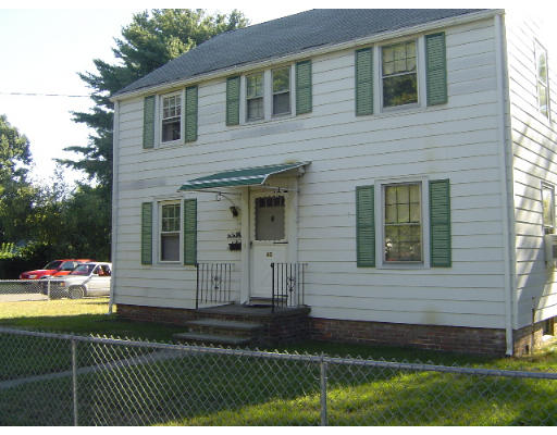 60 Corona Street Springfield, MA 01104 - Photo 1 of 6 a front view of a house with a yard