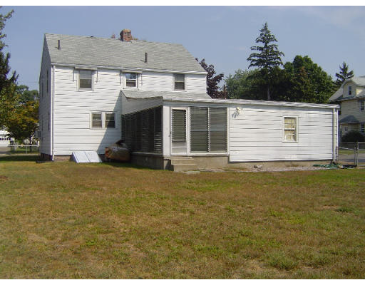 60 Corona Street Springfield, MA 01104 - Photo 6 of 6 a front view of a house with a garden
