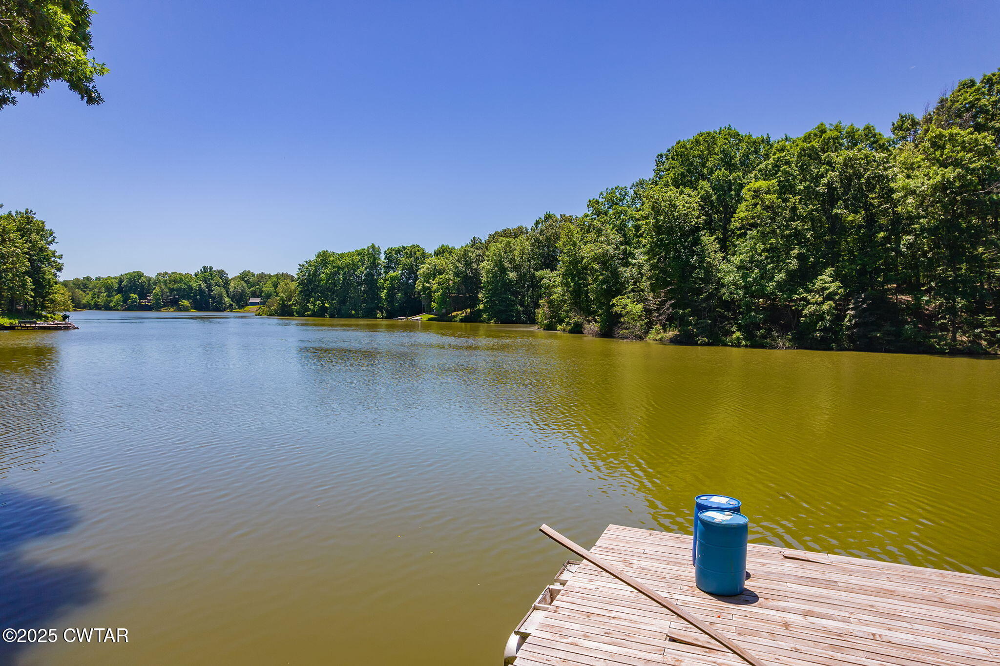 64 Lake Hayes Estates Road Trenton, TN 38382 - Photo 16 of 25 a view of a lake with a outdoor space