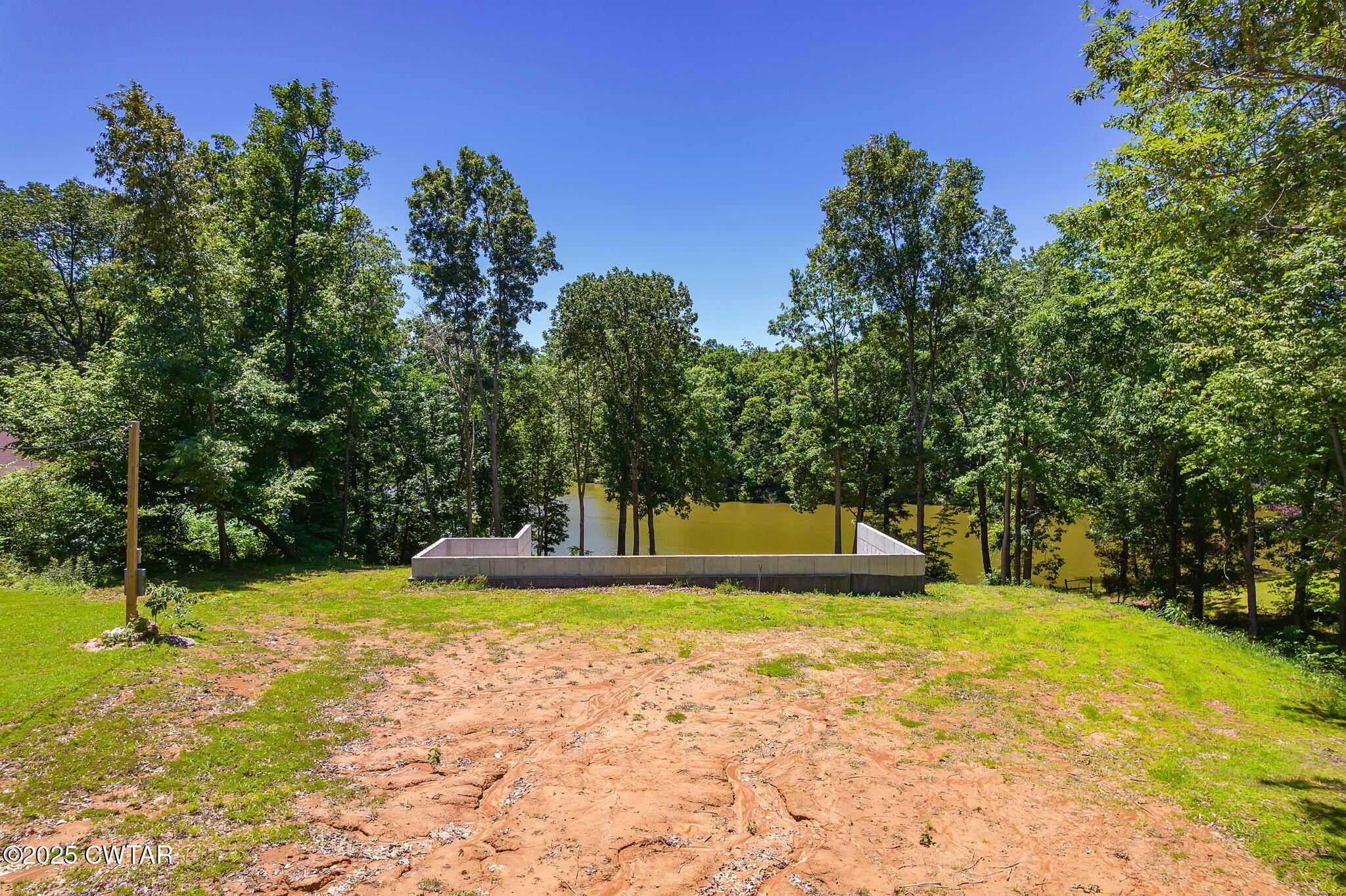 64 Lake Hayes Estates Road Trenton, TN 38382 - Photo 7 of 25 a view of swimming pool with trees
