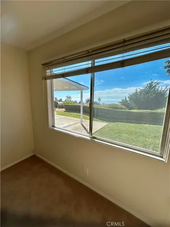a view of an outdoor space with a large window