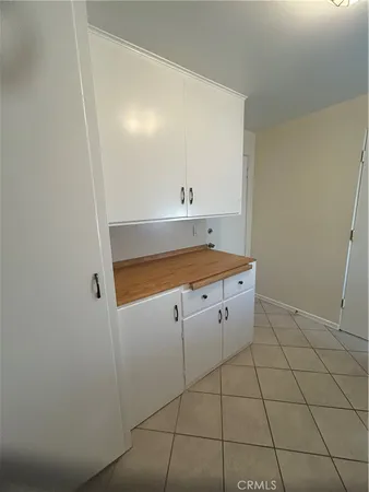 a kitchen with a stove and a microwave