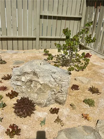 a view of a backyard of a house