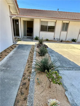 a view of a house with garden