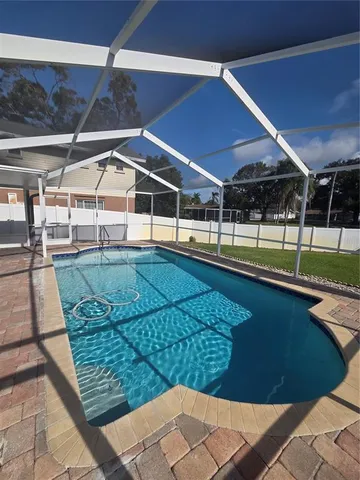 a view of a backyard of a house
