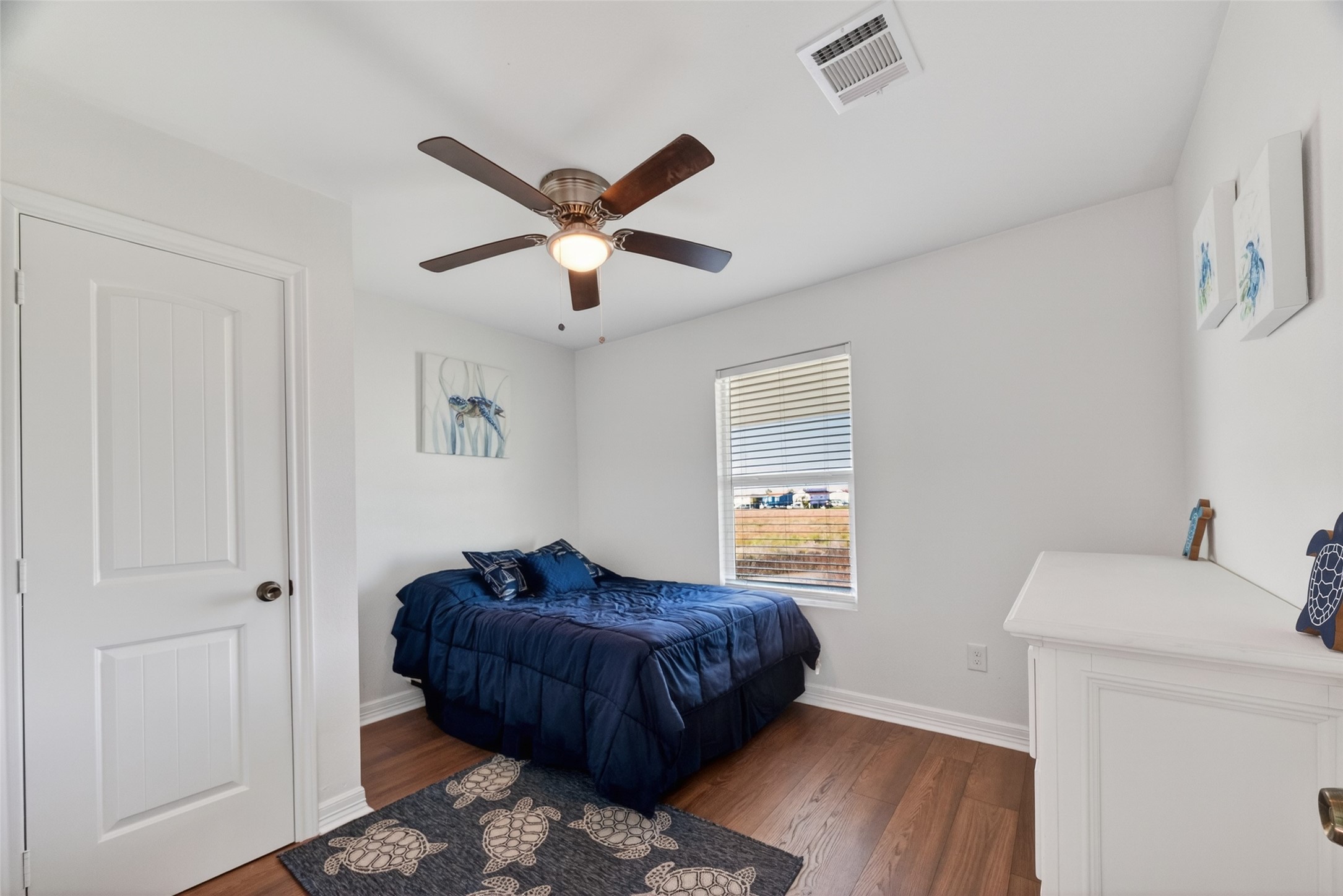 154 Poop Deck Lane Freeport, TX 77541 - Photo 16 of 32 a living room with a bed and a window