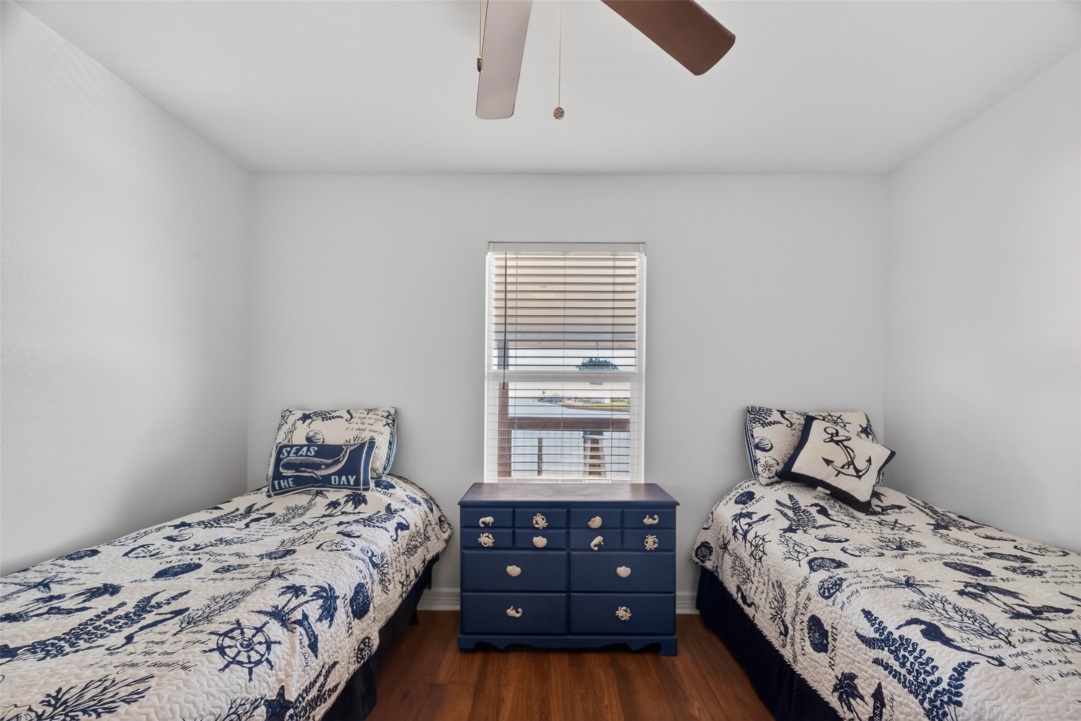 154 Poop Deck Lane Freeport, TX 77541 - Photo 20 of 32 a bedroom with a bed and a window