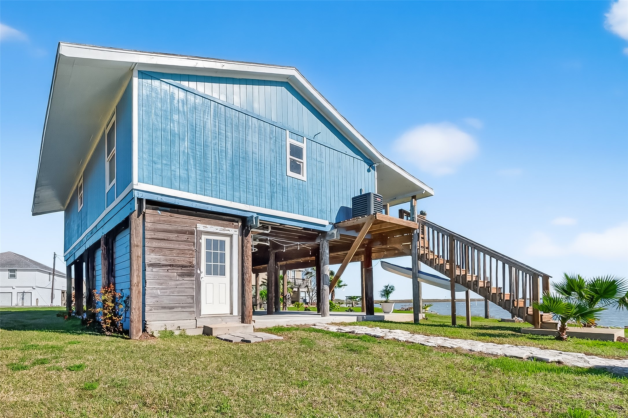 154 Poop Deck Lane Freeport, TX 77541 - Photo 28 of 32 a house view with a garden space