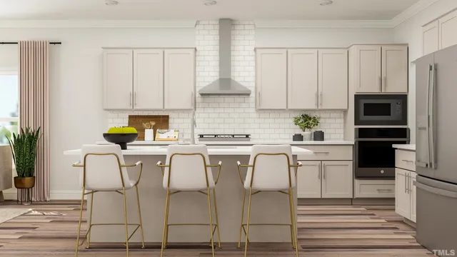 a white kitchen with appliances cabinets and furniture