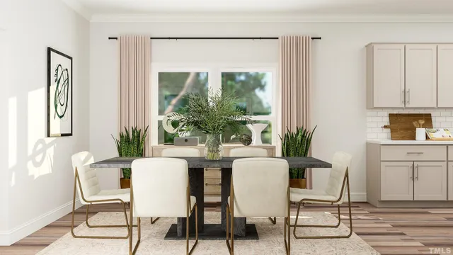 a dining room with furniture and window