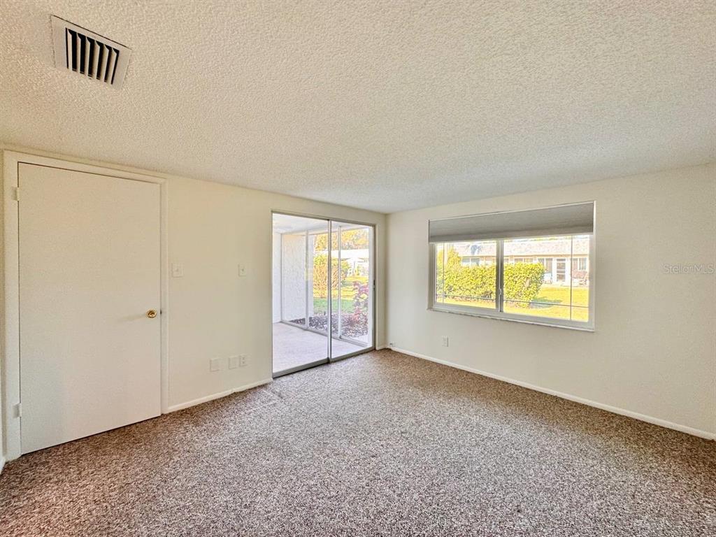 3422 Trophy Boulevard New Port Richey, FL 34655 - Photo 14 of 21 a view of an empty room with a window