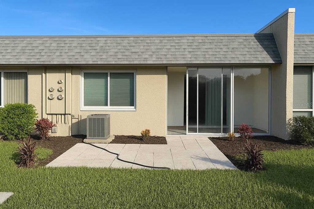 3422 Trophy Boulevard New Port Richey, FL 34655 - Photo 17 of 21 a front view of a house with a yard