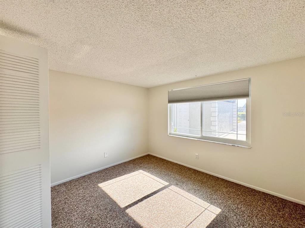 3422 Trophy Boulevard New Port Richey, FL 34655 - Photo 8 of 21 a view of an empty room with a window