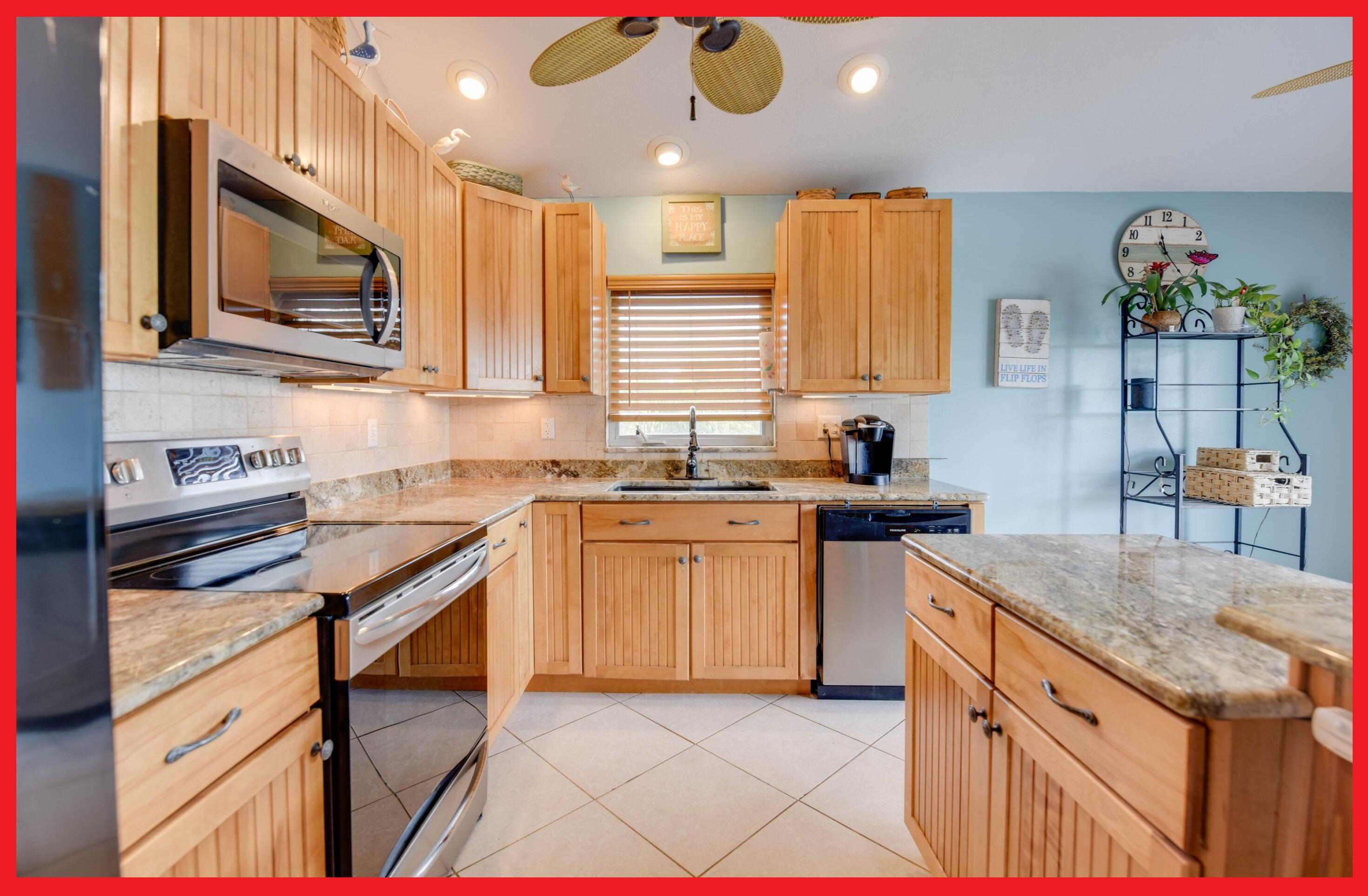 29857 Tropical Trader Road Big Pine Key, FL 33043 - Photo 1 of 36 014-29857TropicalTrader_Kitchen Border