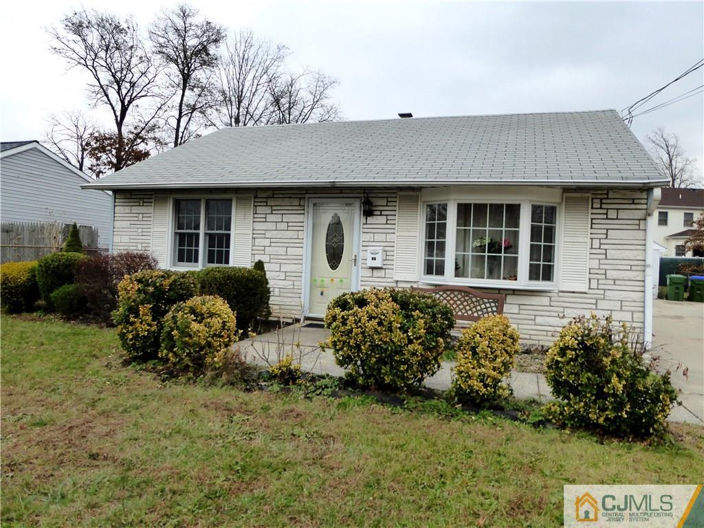 38 Crescent Road Edison, NJ 08817 - Photo 4 of 18 a front view of a house with garden