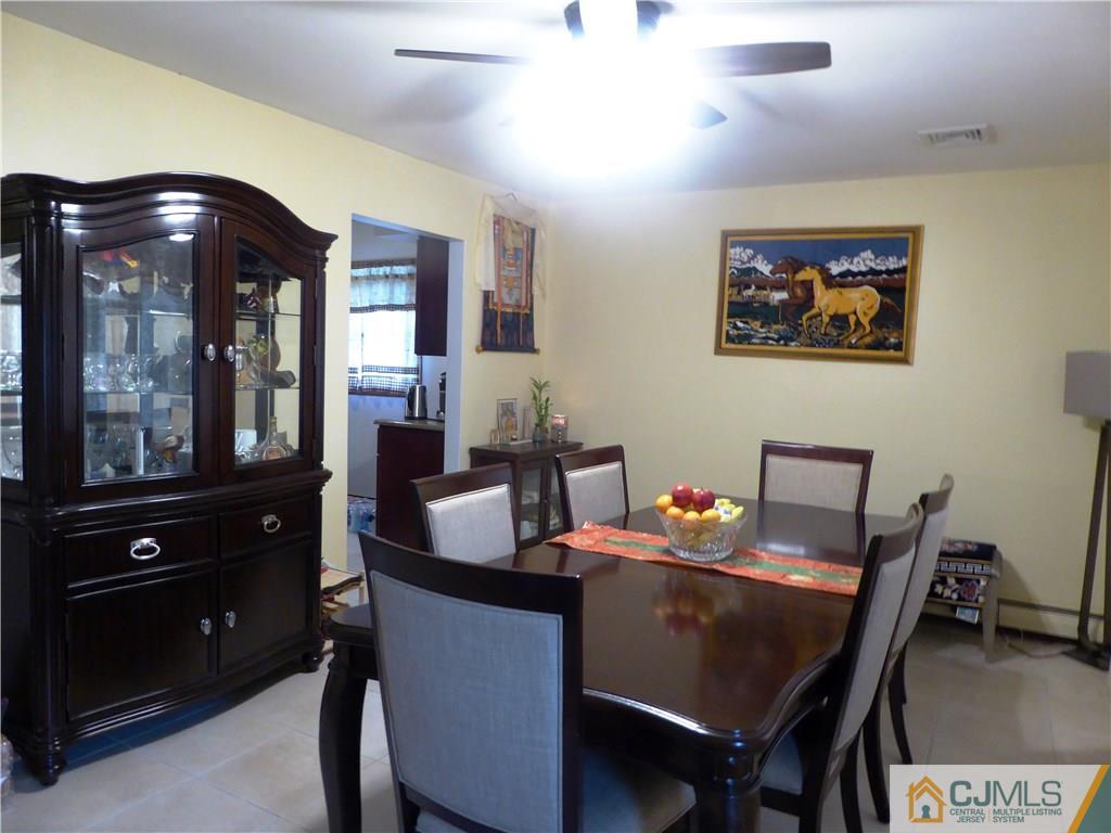 38 Crescent Road Edison, NJ 08817 - Photo 5 of 18 a dining room with furniture and window
