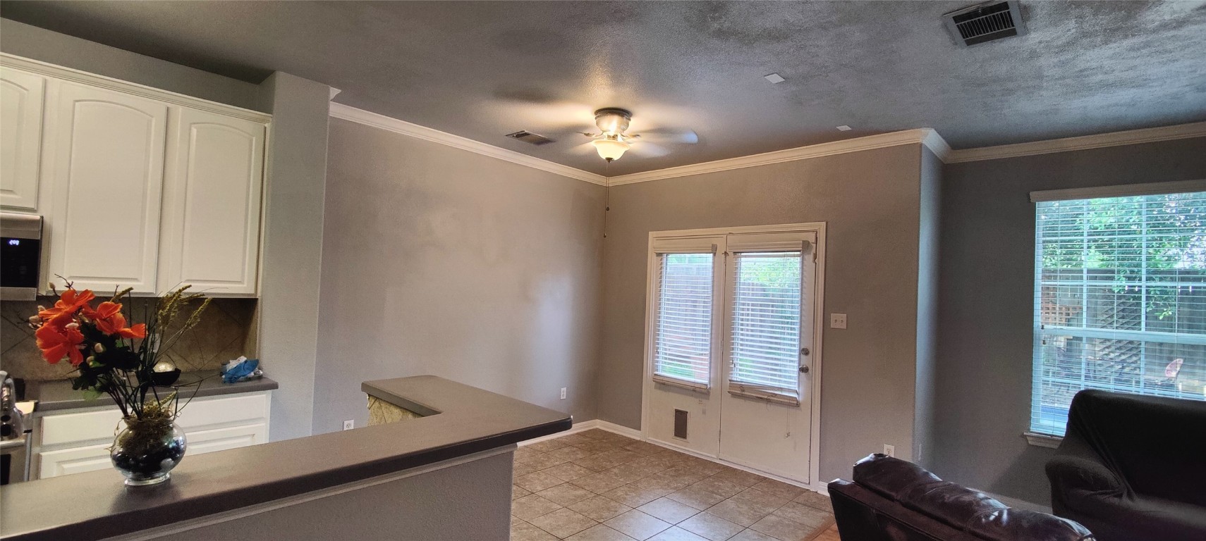 a room with furniture and window