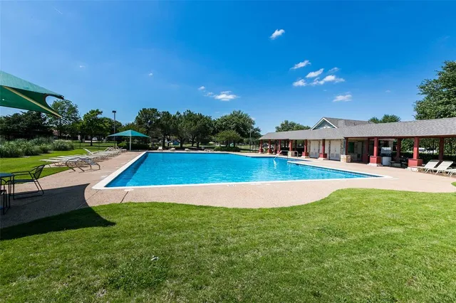 a view of outdoor space yard and swimming pool