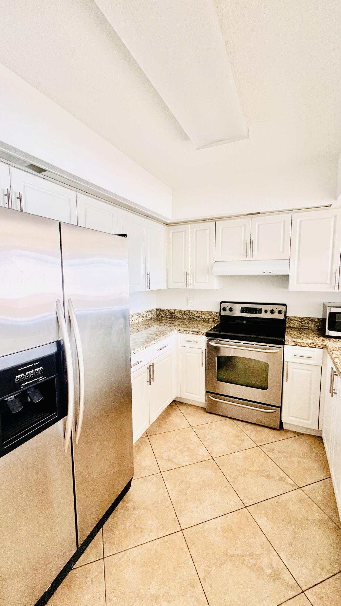 18810 Northwest 57th Avenue, Unit 201 Hialeah, FL 33015 - Photo 4 of 9 IMG_7985