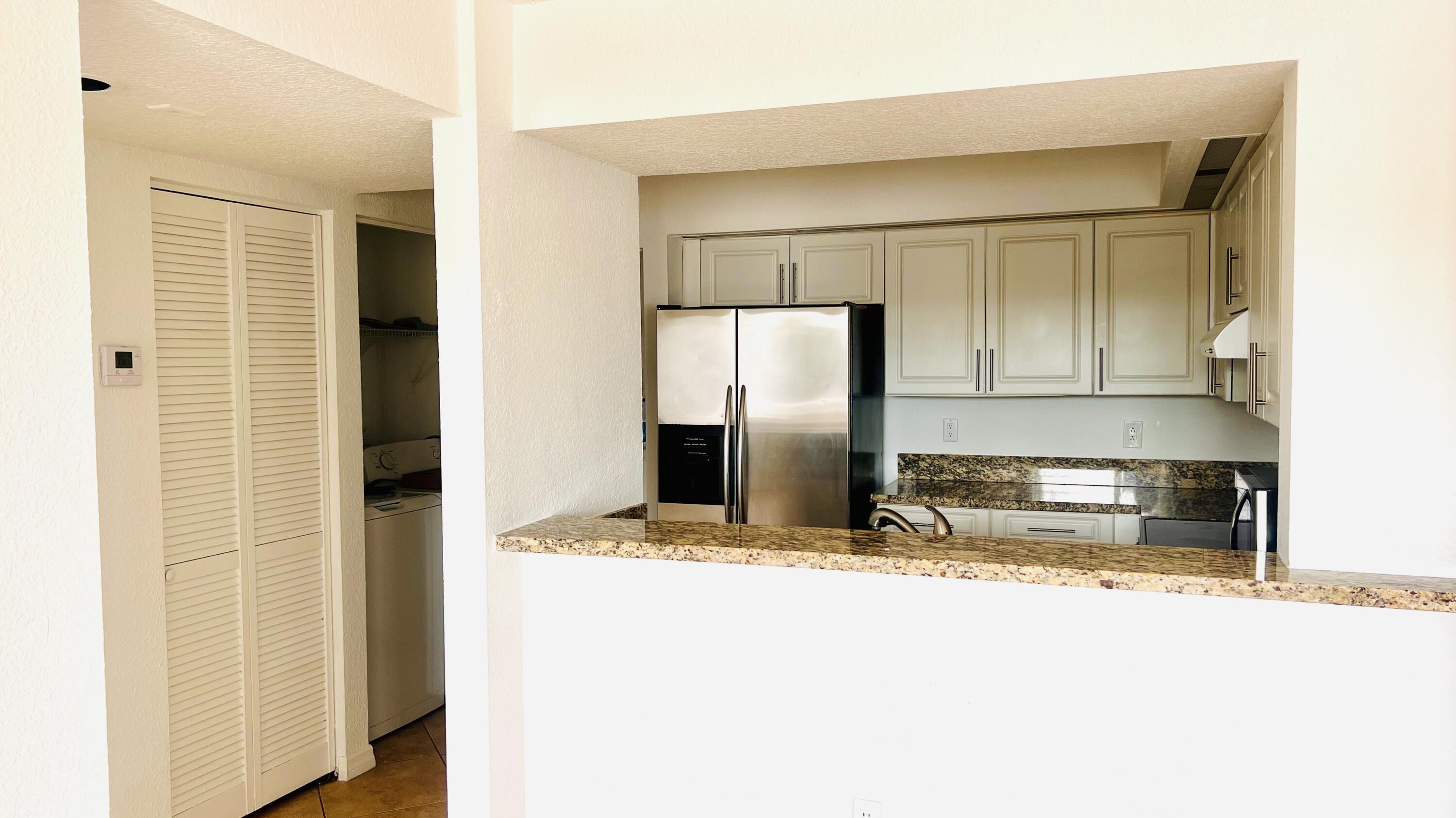 18810 Northwest 57th Avenue, Unit 201 Hialeah, FL 33015 - Photo 5 of 9 IMG_7986