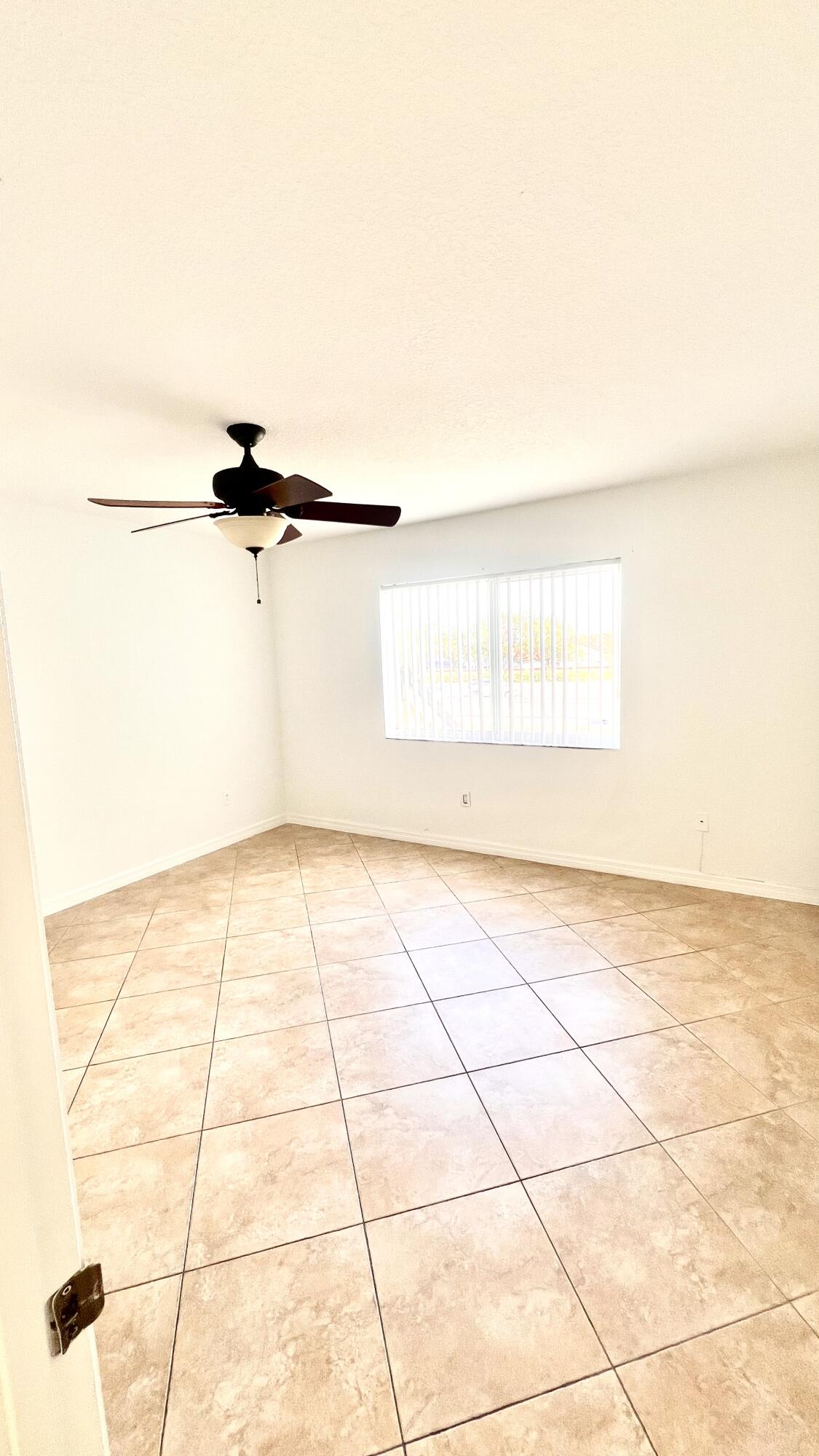 18810 Northwest 57th Avenue, Unit 201 Hialeah, FL 33015 - Photo 8 of 9 IMG_7989