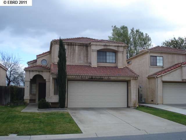237 Rolfe Drive Pittsburg, CA 94565 - Photo 1 of 1 a front view of a house with a garden