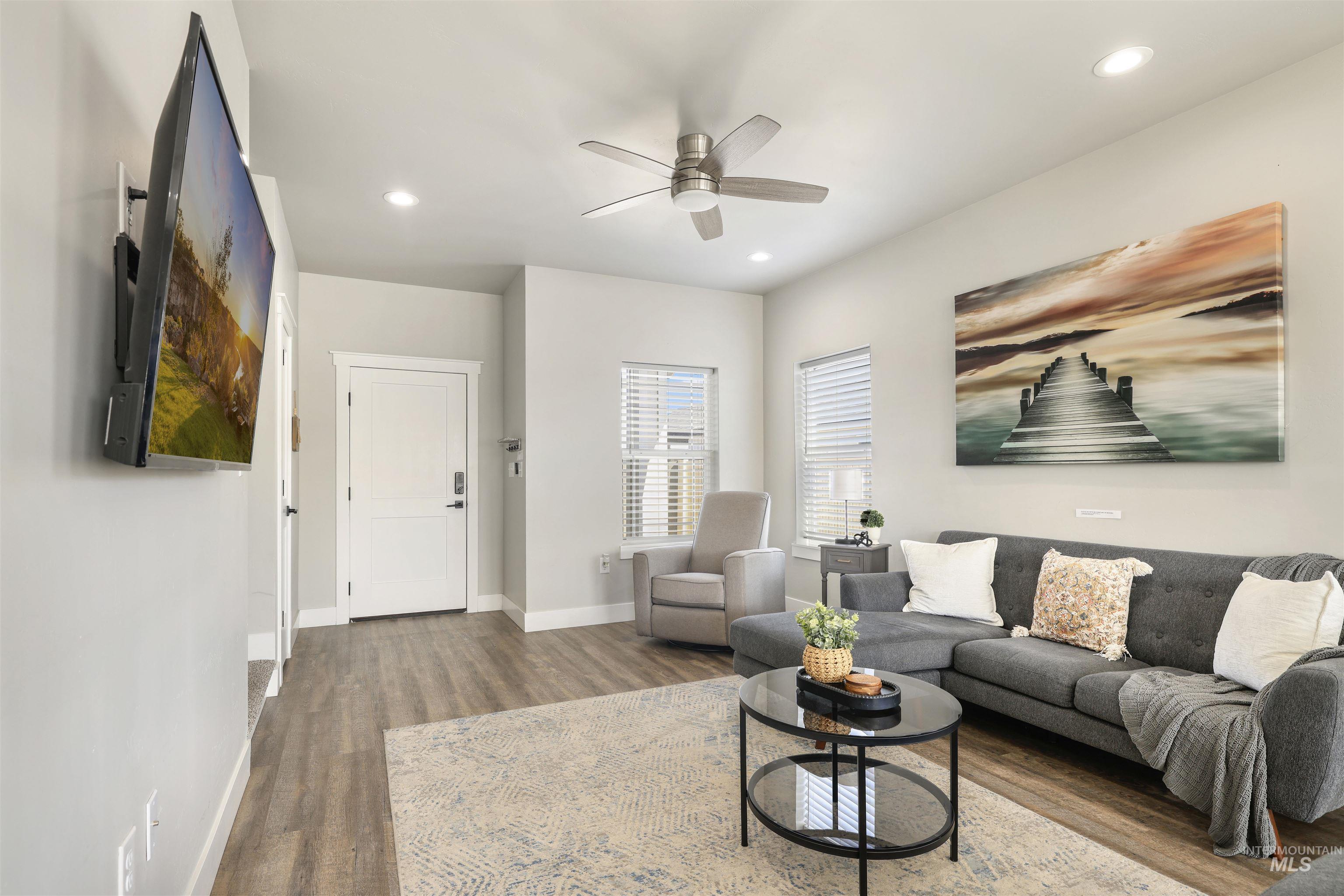 893-899 Shadowleaf Avenue Twin Falls, ID 83301 - Photo 19 of 50 Living area featuring wood finished floors, a ceiling fan, and recessed lighting