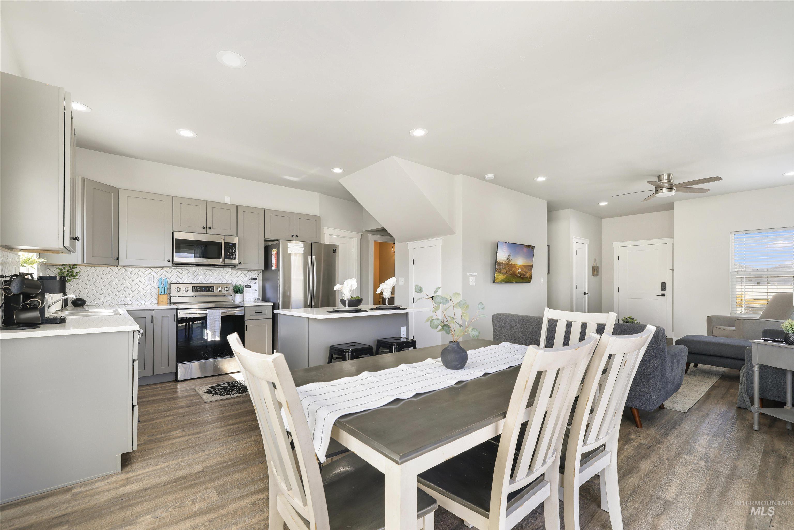 893-899 Shadowleaf Avenue Twin Falls, ID 83301 - Photo 22 of 50 Dining room featuring dark wood-style flooring, recessed lighting, and ceiling fan
