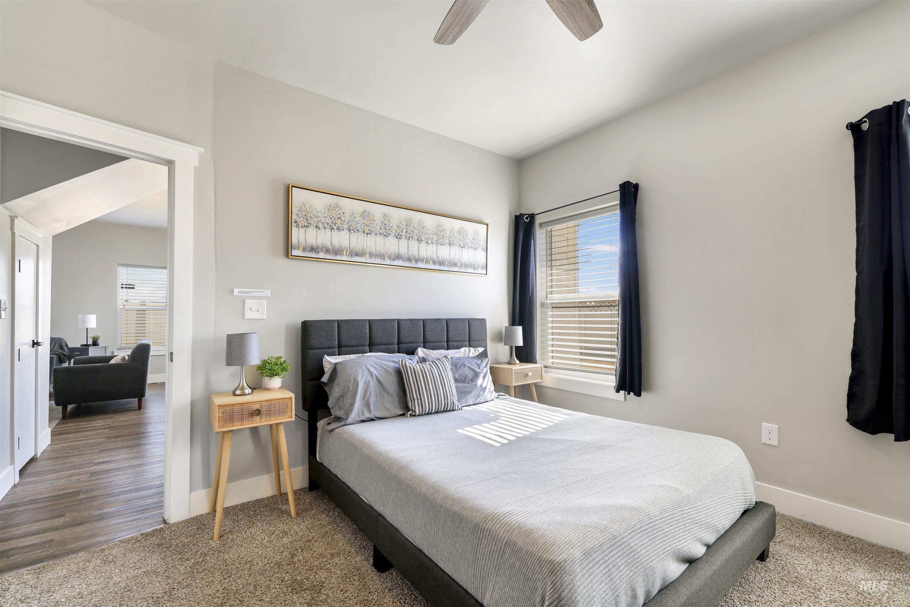 893-899 Shadowleaf Avenue Twin Falls, ID 83301 - Photo 28 of 50 Bedroom featuring carpet floors and a ceiling fan